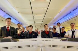 Air Canada Rouge employees in flight