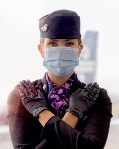 air new zealand female flight attendant mask