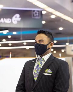 air new zealand male crew with mask