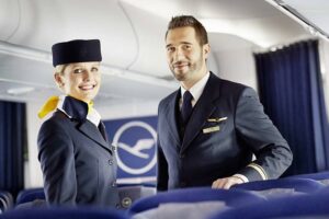 lufthansa man and woman flight attendant in uniform