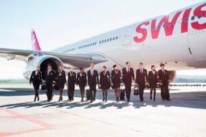 male and female swiss international flight attendants