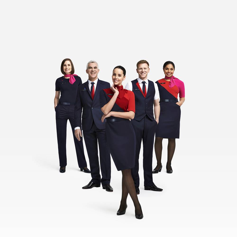 qantas airlines male and female flight attendants in uniform
