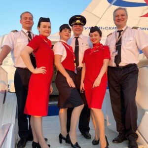 ural airlines female cabin crew uniform with pilots