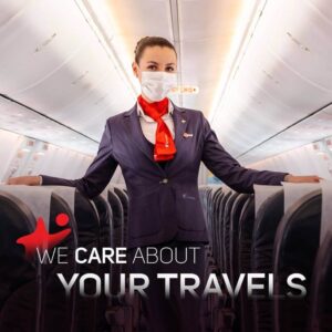 corendon airlines flight attendant with mask