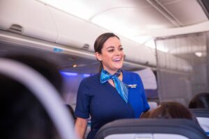 Alaska Airlines cabin crew woman flight attendant