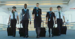 frontier airlines crew staff smiling