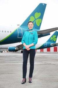 Aer Lingus female flight attendant in uniform
