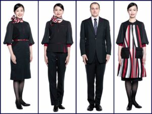 Japan Airlines male and female flight attendants in uniform