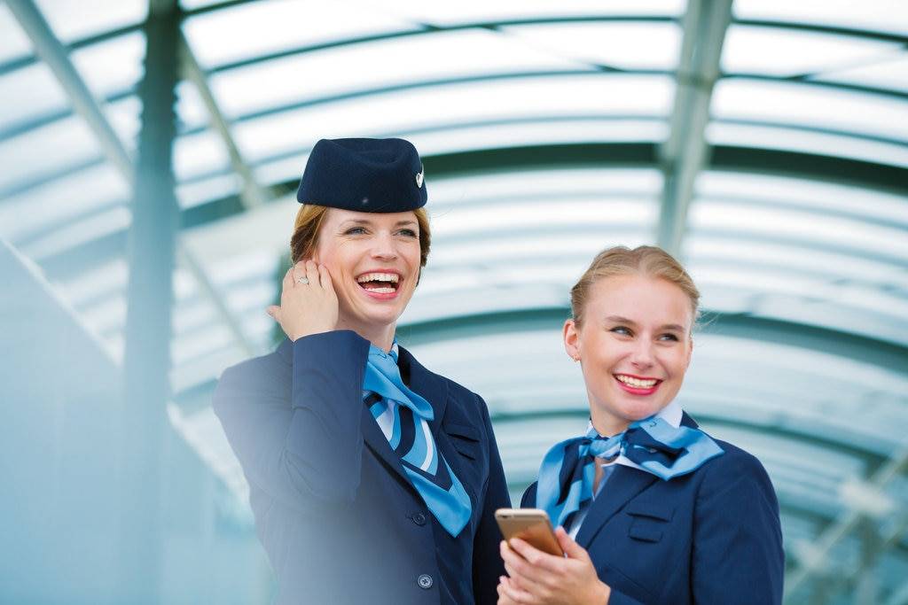 TUI female cabin crew smiling