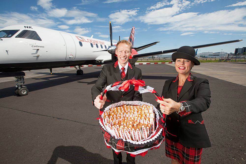 loganair male and female flight attendant