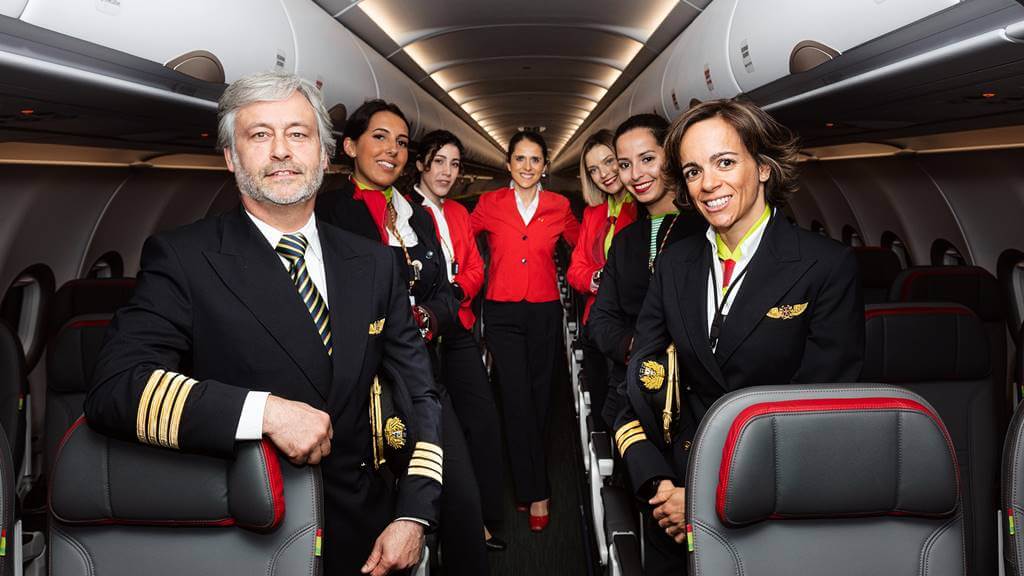 TAP Air Portugal flight attendants with pilot