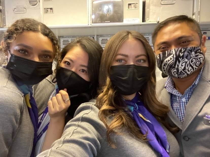 avelo airlines flight attendants with masks