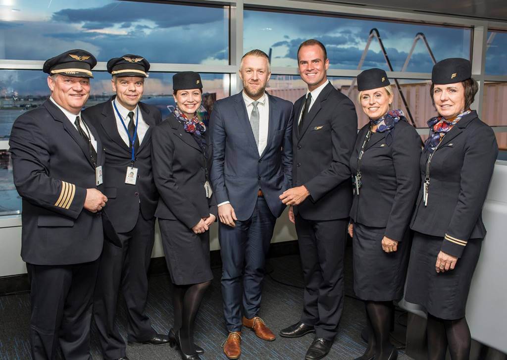 icelandair male and female crew with pilot