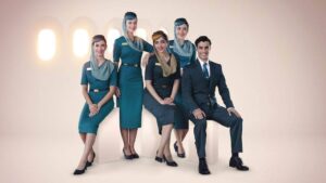 oman air male and female flight attendants in uniforms
