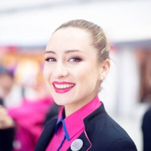 wizz air female flight attendant smile