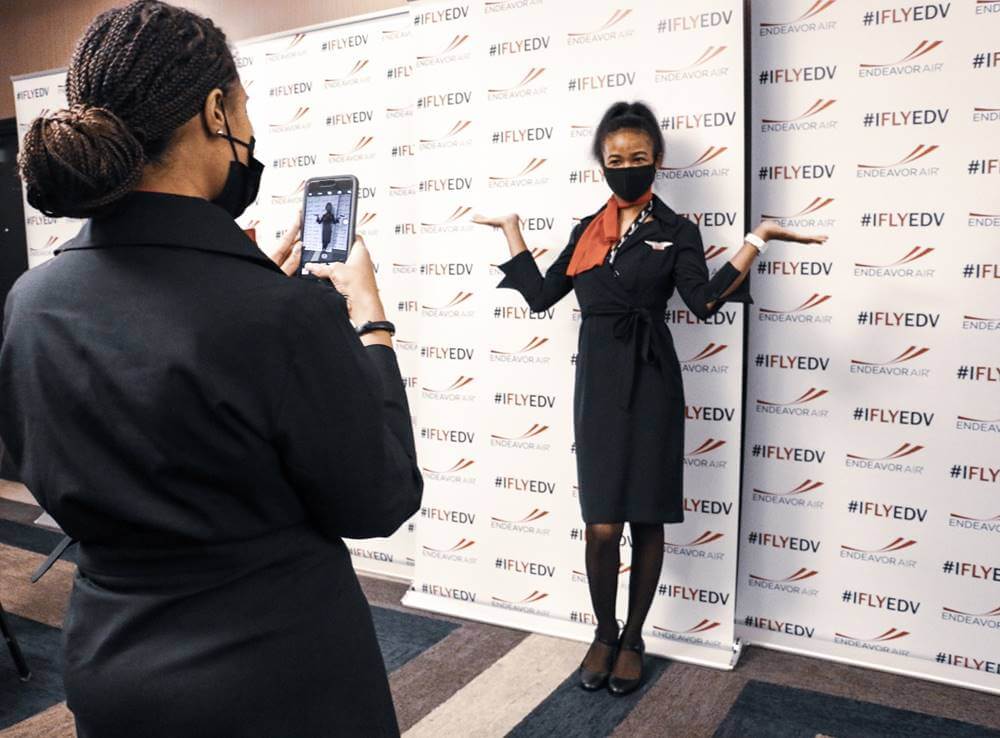 endeavor air female crew pose