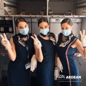 aegean airlines flight attendant team with masks