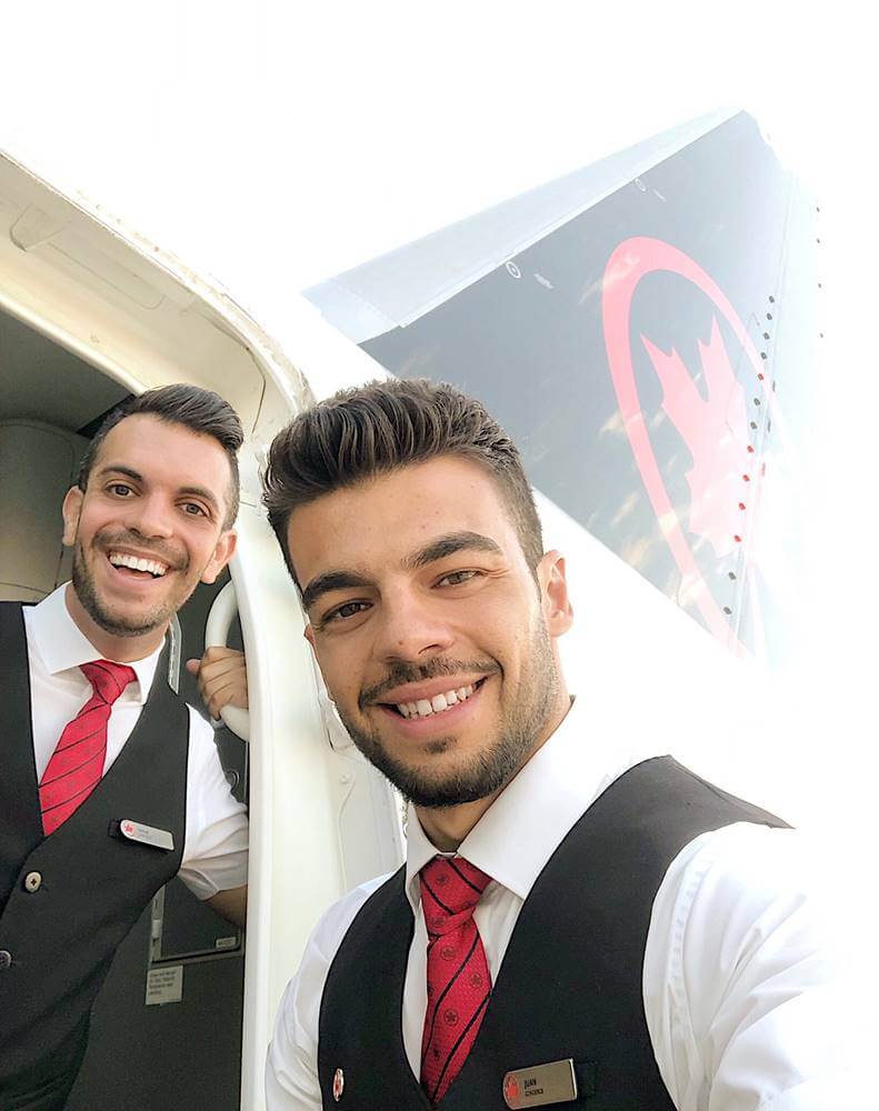 air canada happy male flight attendants