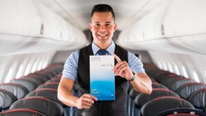 envoy air male flight attendant inside plane