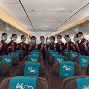 garuda indonesia flight attendants heart sign