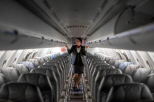 jazz female flight attendant cabin