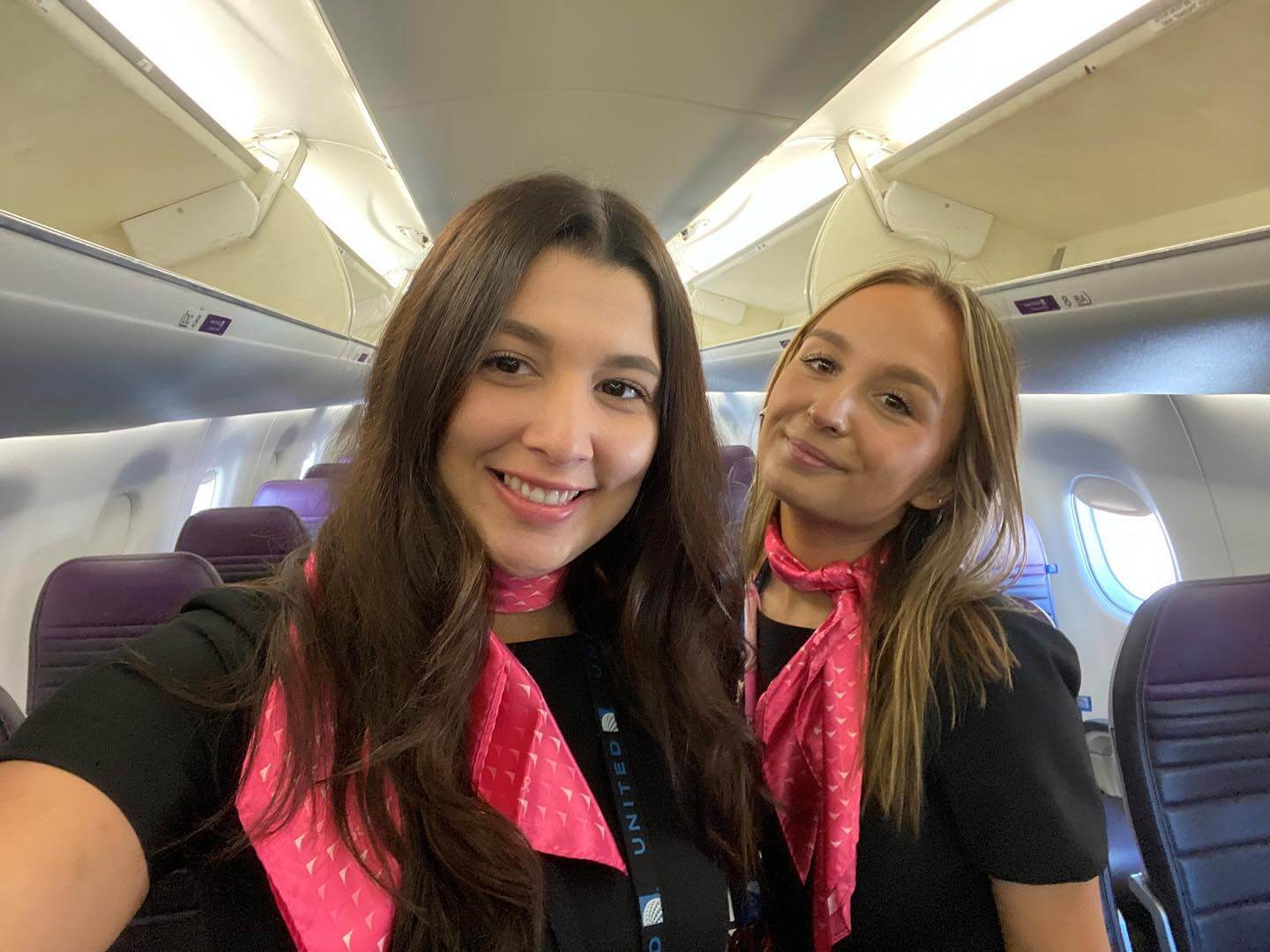mesa airlines flight attendants in cabin