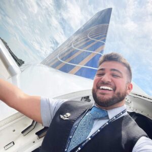 mesa airlines happy male flight attendant