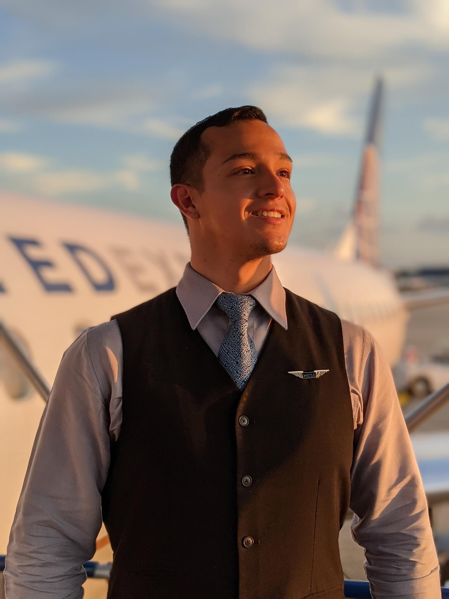 mesa airlines proud male flight attendant