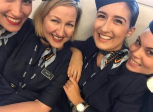 porter airlines happy female flight attendants