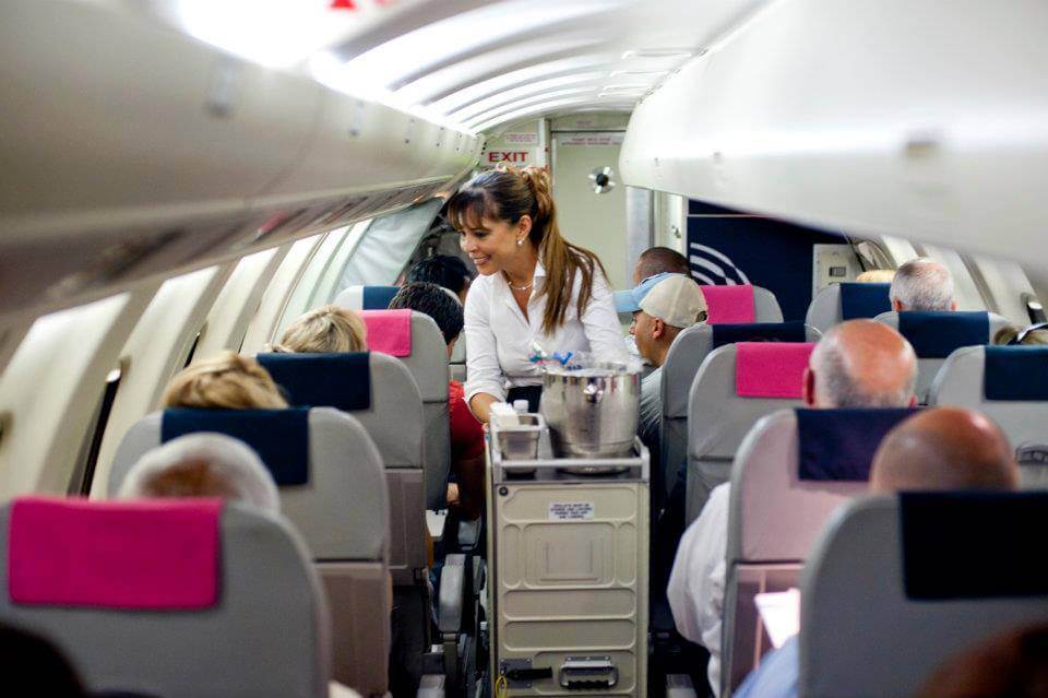 silver airways crew with trolley