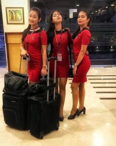 spicejet female cabin crew with luggage bag