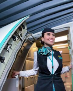 flynas female cabin crew smiling