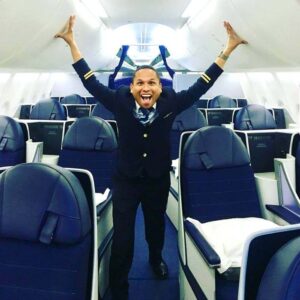 Copa Airlines happy male flight attendant