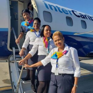 InterCaribbean female flight attendants steps