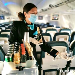 Luxair cabin crew serving bubbles
