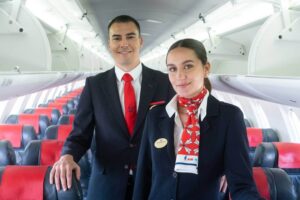 air nostrum male and female flight attendant cabin