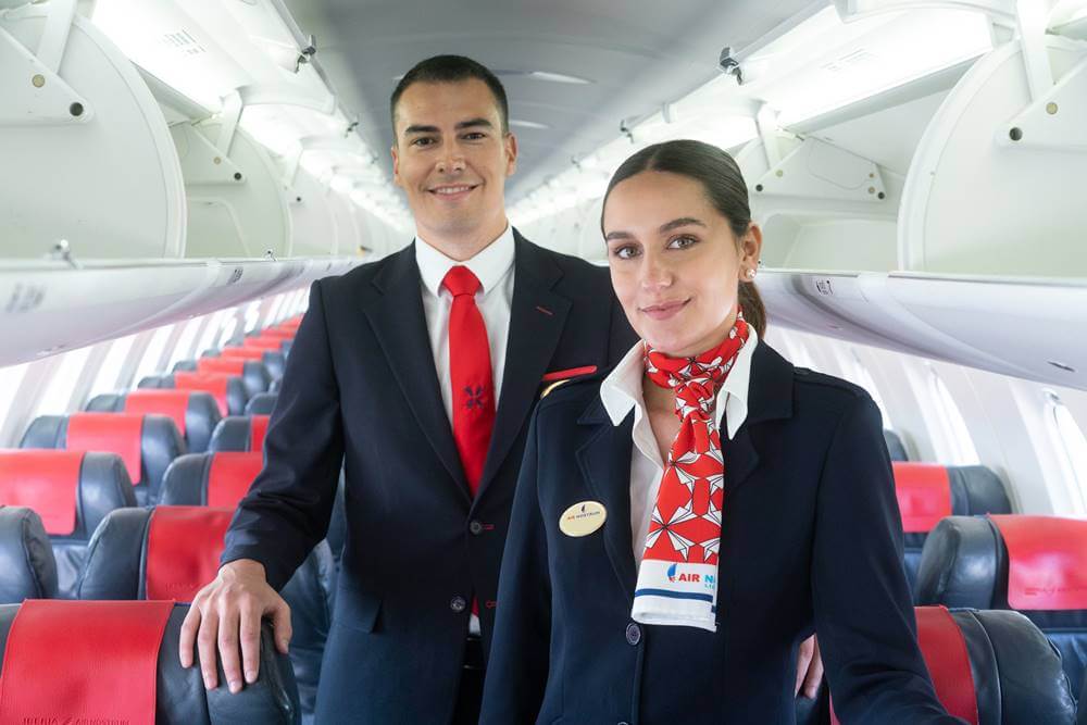 air nostrum male and female flight attendant cabin