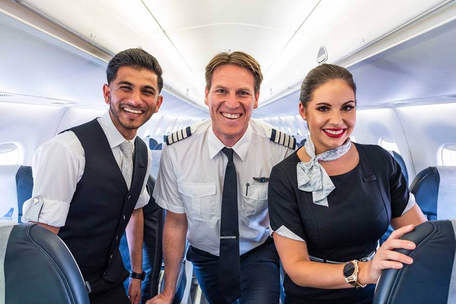 airnorth australia male and female flight attendants with pilot
