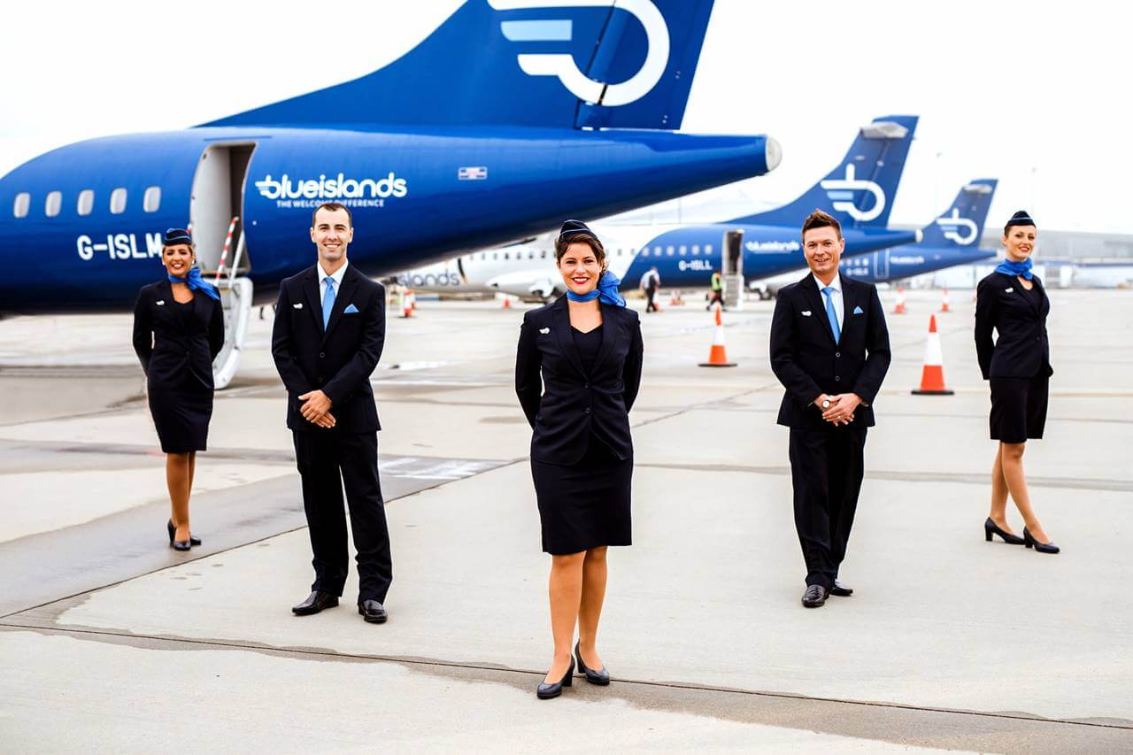 blue islands male and female flight attendant uniforms