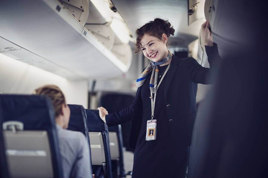 female pal provincial airlines flight attendant smile