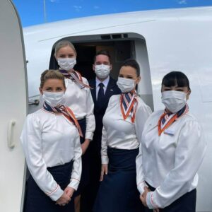 rex airlines flight attendants with masks