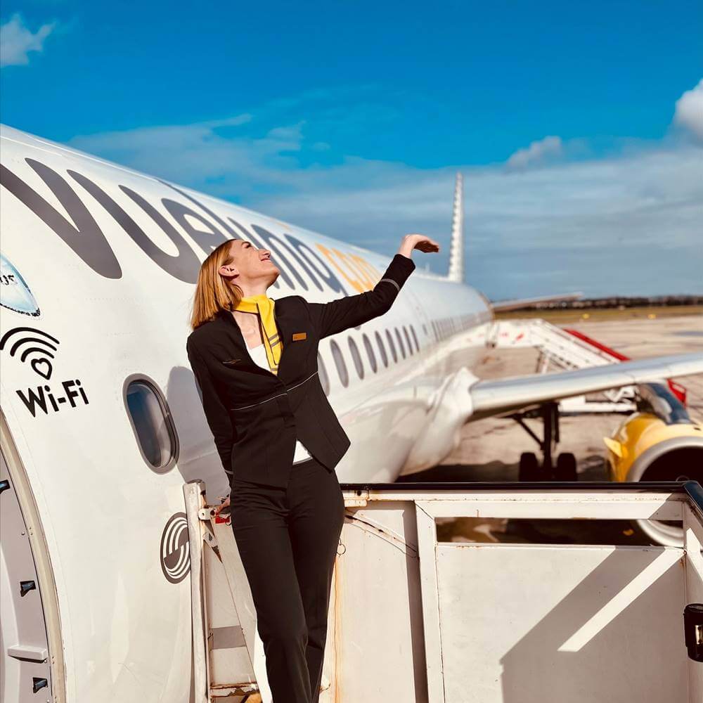 vueling flight attendant happy