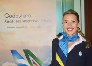 Aerolineas Argentinas female flight attendant smile