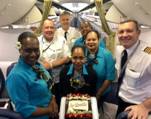 Air Vanuatu cabin crews with cake