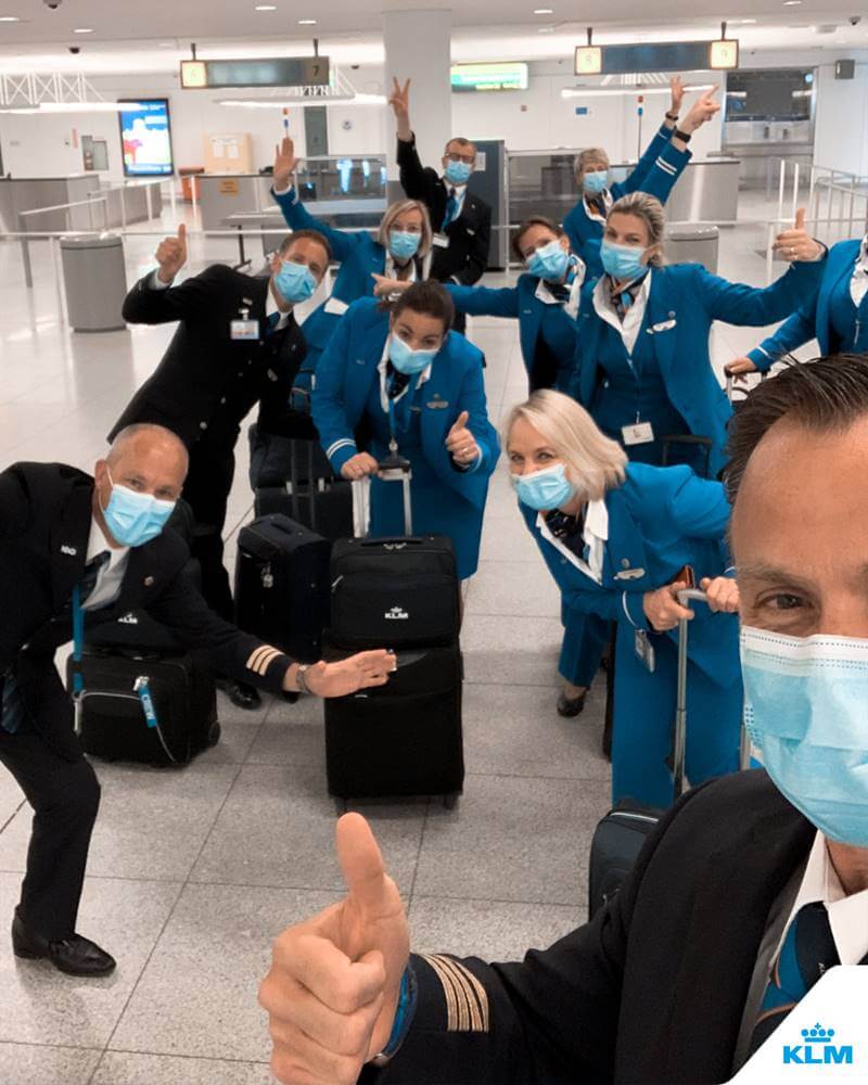 KLM Cityhopper cabin crew male and female with masks