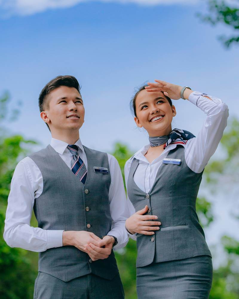 air astana male and female flight attendant uniforms