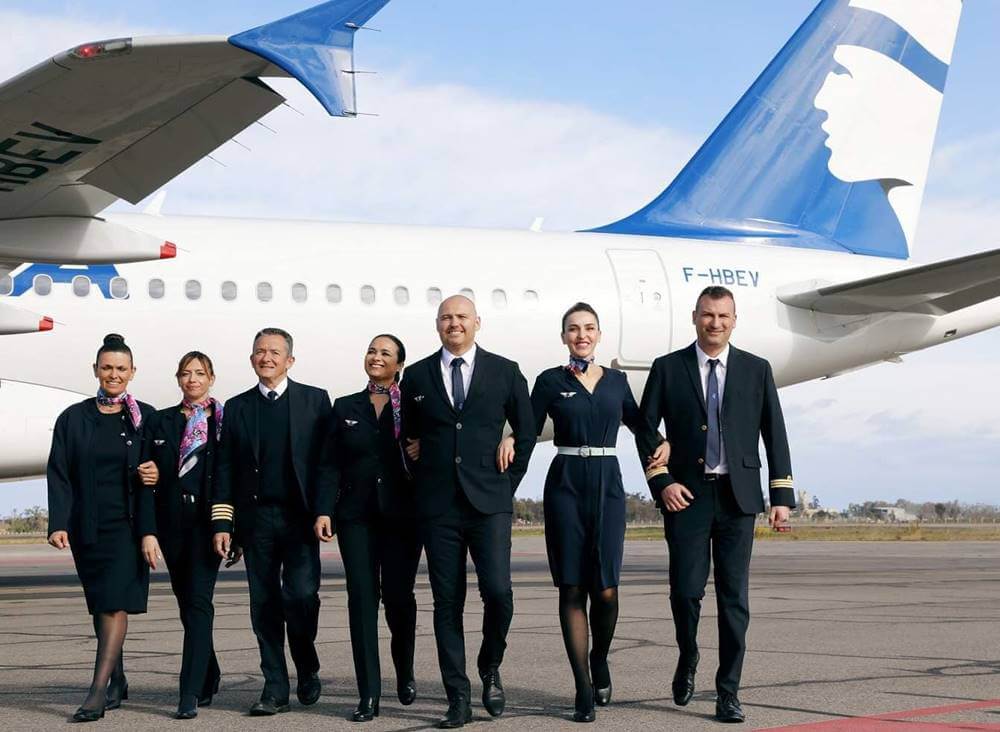 air corsica male and female flight attendants with pilots