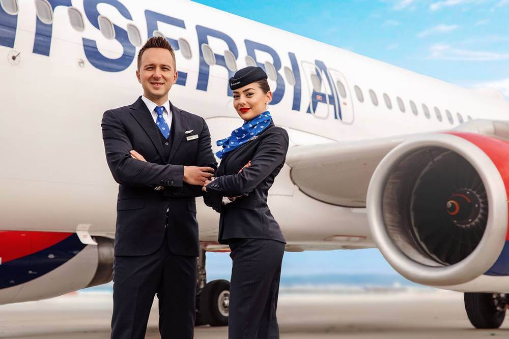 air serbia male and female flight attendants