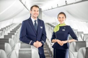 airbaltic male and female cabin crew smile