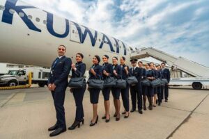 kuwait airways male and female flight attendants with pilot